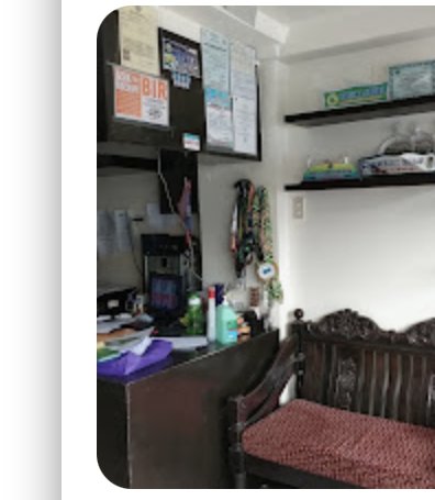 Inside Kats PrintShop — awards and souvenir display shelf